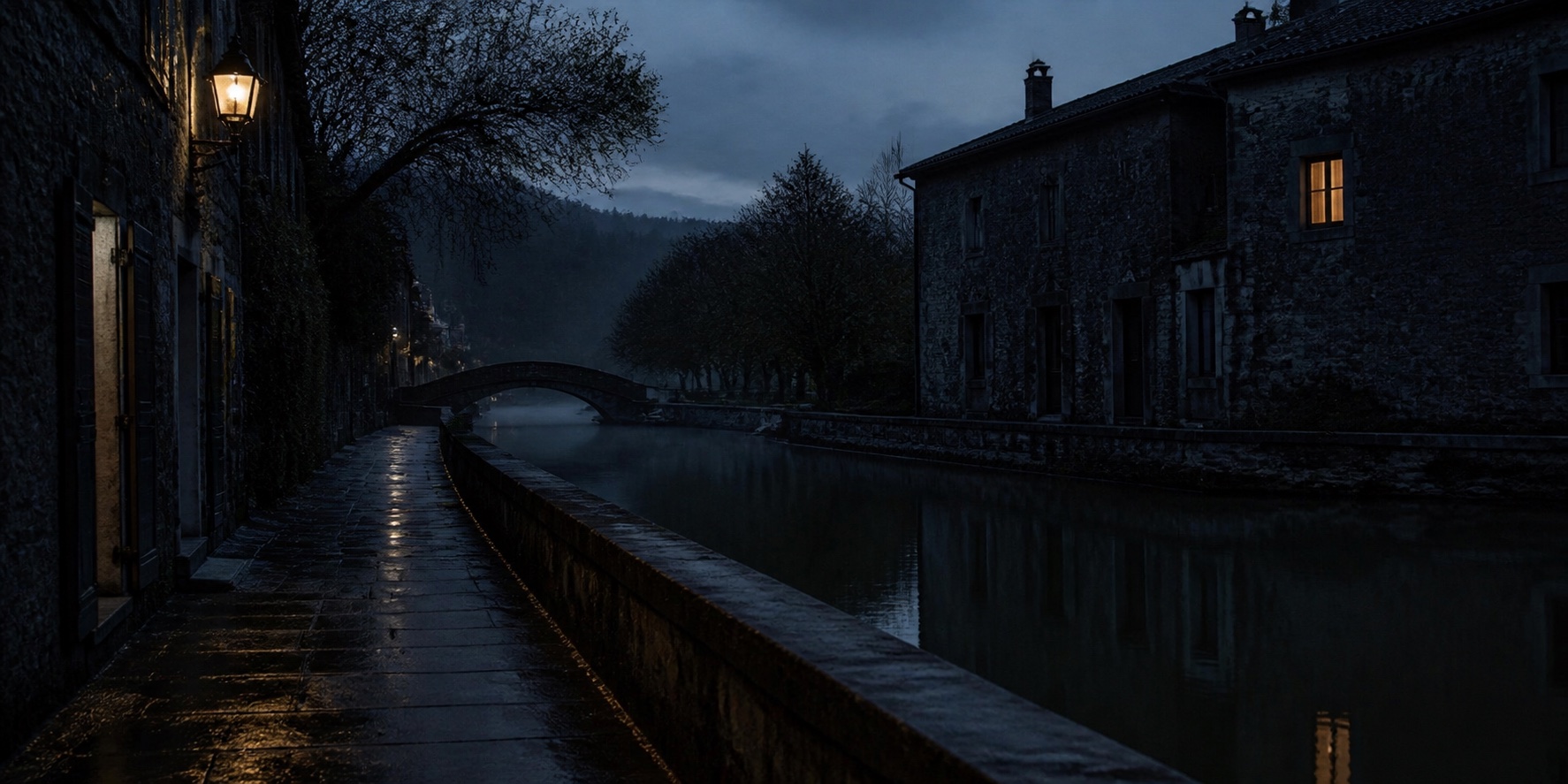 Still canal water beside old stone houses after rain