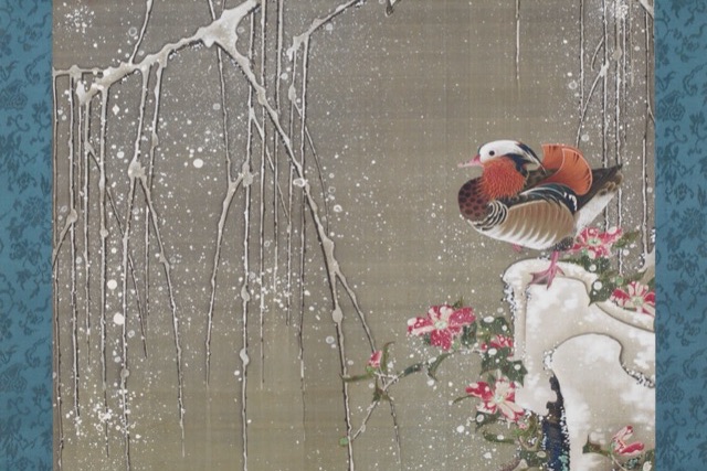 A hanging scroll painting of snow-laden willow branches above a pool, with a mandarin drake on a snowy rock among red camellias and a second duck in the water.